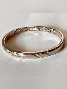 🌷5/25$ China articulated bangle bracelet, made of polished silver metal